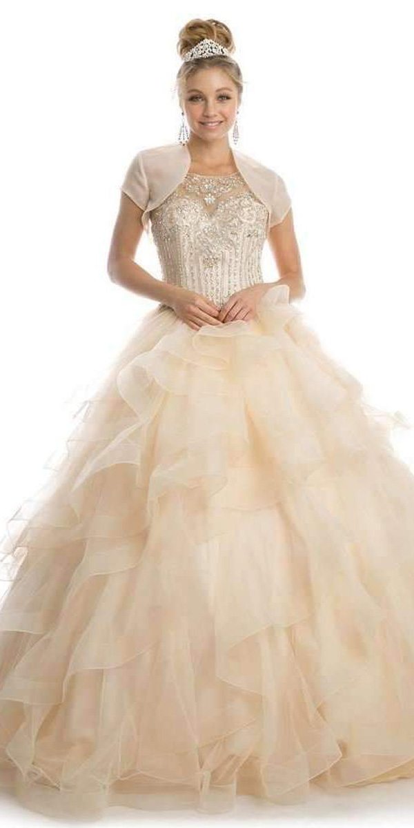 Champagne A-line ball gown with beaded bodice, tulle skirt, and satin jacket