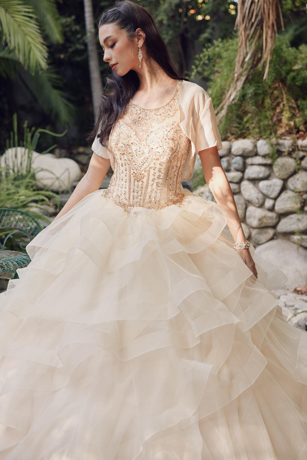 Champagne A-line ball gown with beaded bodice, sheer short sleeves, tiered tulle skirt