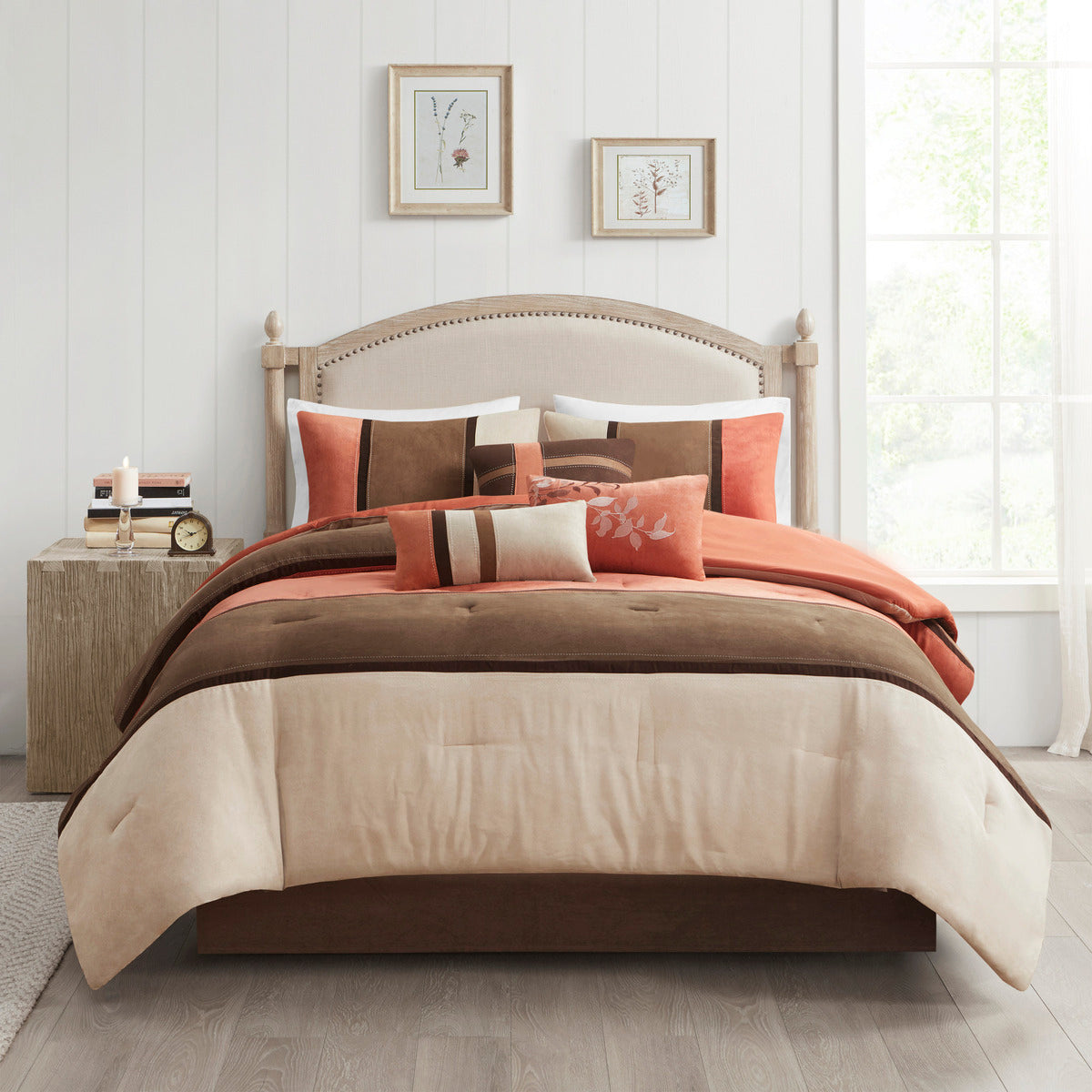 Queen comforter set with coral and brown comforter, cream panel, and decorative pillows
