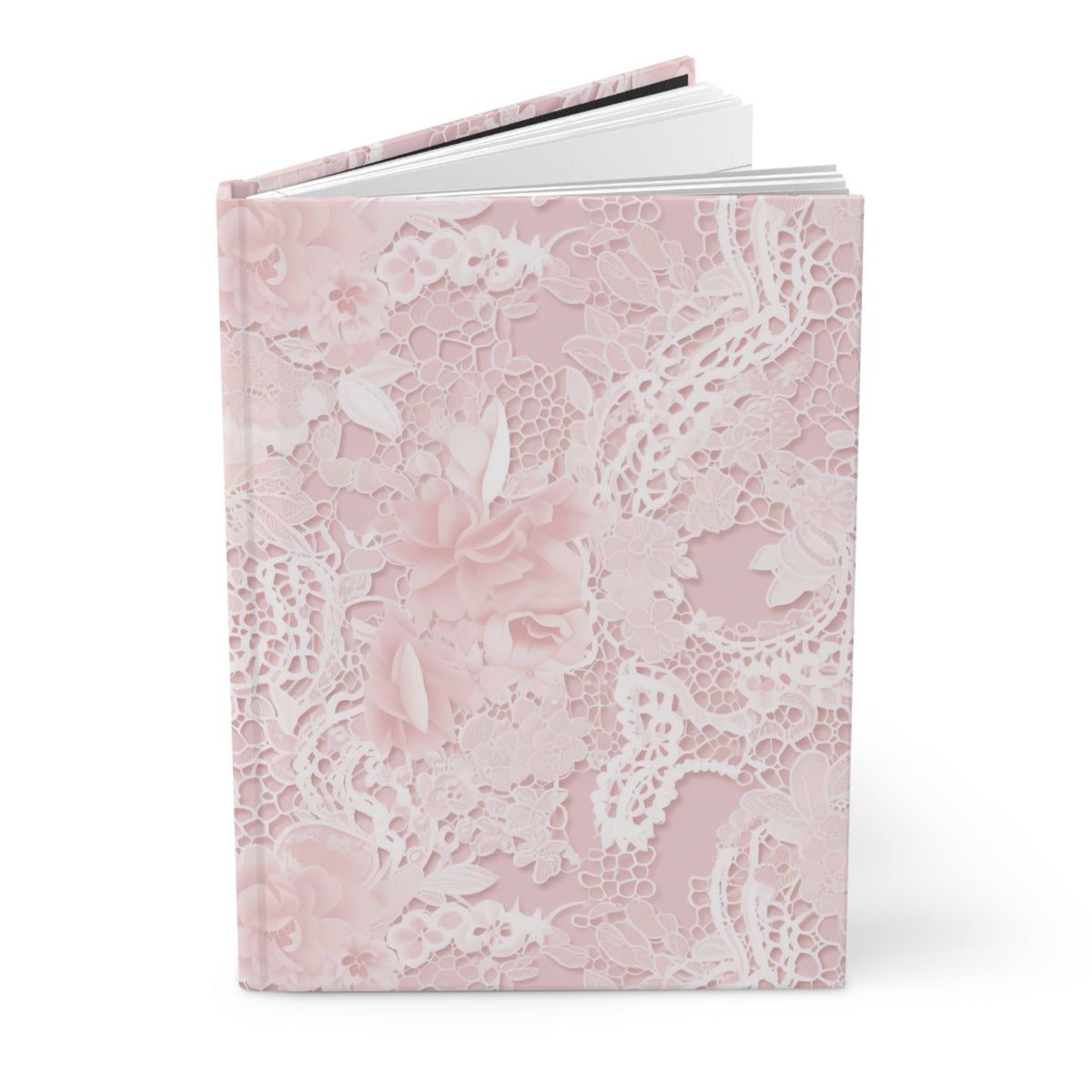 Pink floral lace hardcover journal, side view showing thick spine and layered pages
