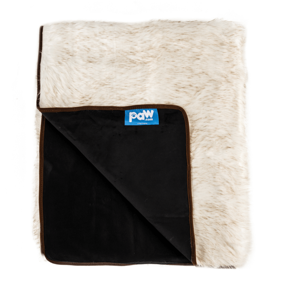 White faux-fur waterproof blanket with black backing and brown edge trim, Paw.com label
