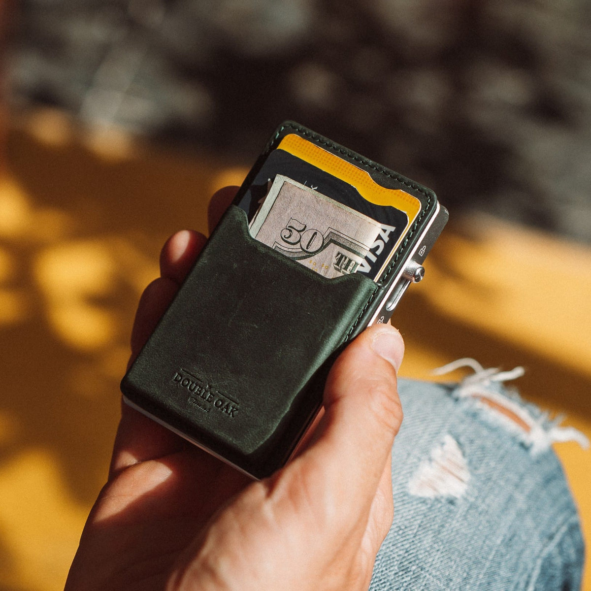 Black leather mod wallet with card window and metal clip, yellow trim edge