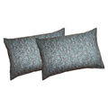 Pair of dark teal pillowcases with lattice floral watercolor pattern and dark borders