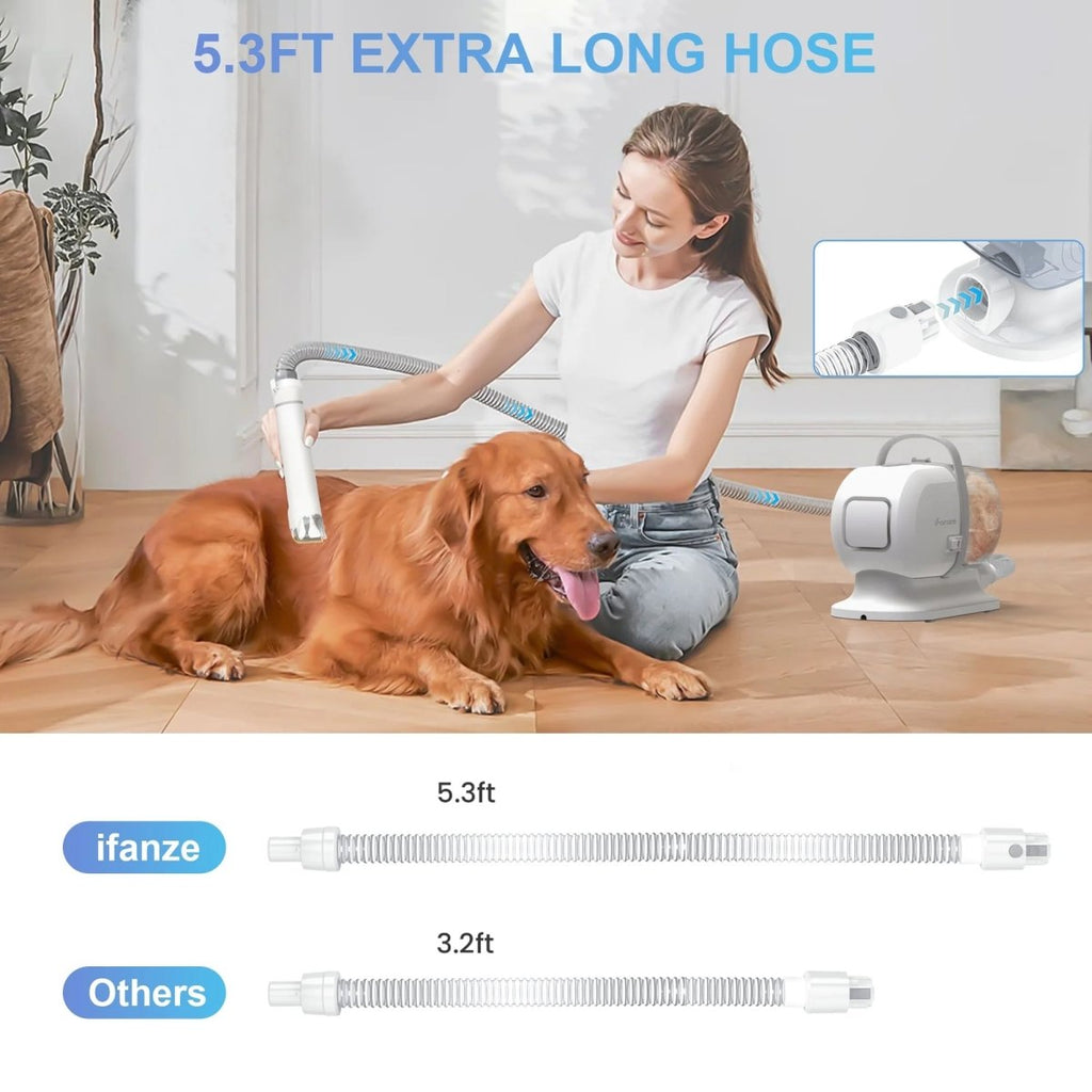 Pet grooming vacuum kit with an extra-long hose and grooming attachment beside a dog.