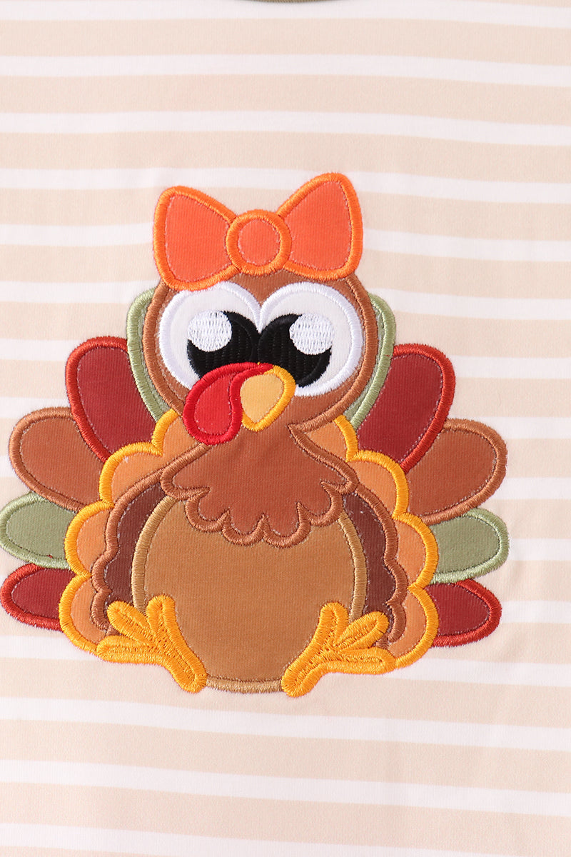 Turkey applique with orange bow on striped long-sleeve shirt