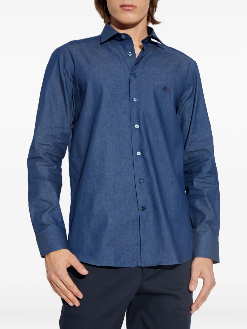 Blue cotton button-down shirt with small embroidered chest logo, long sleeves