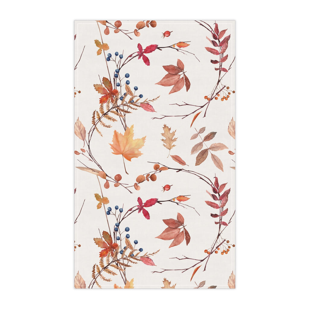 Fall foliage tea towel with repeating autumn leaves, berries, and branches design