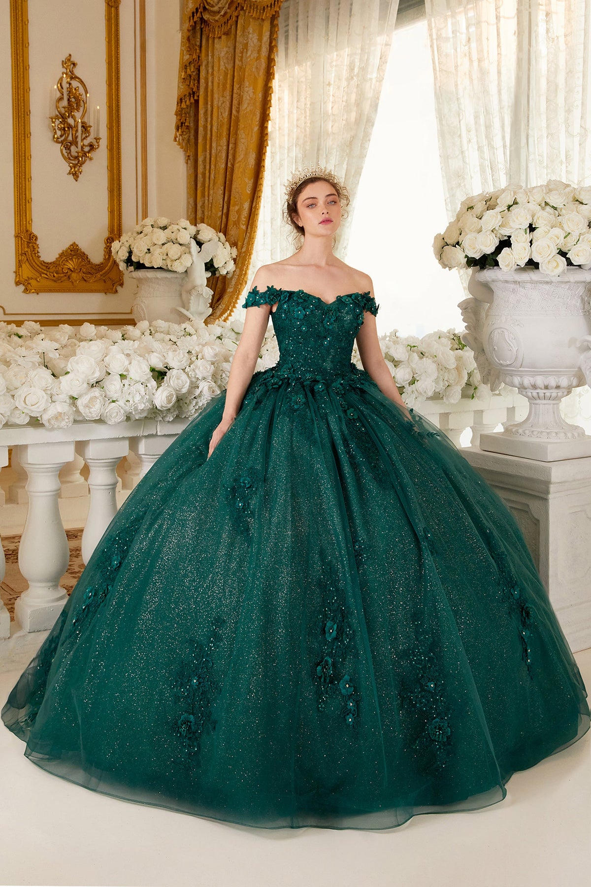 Emerald green off-shoulder ball gown with sparkle bodice and voluminous tulle skirt