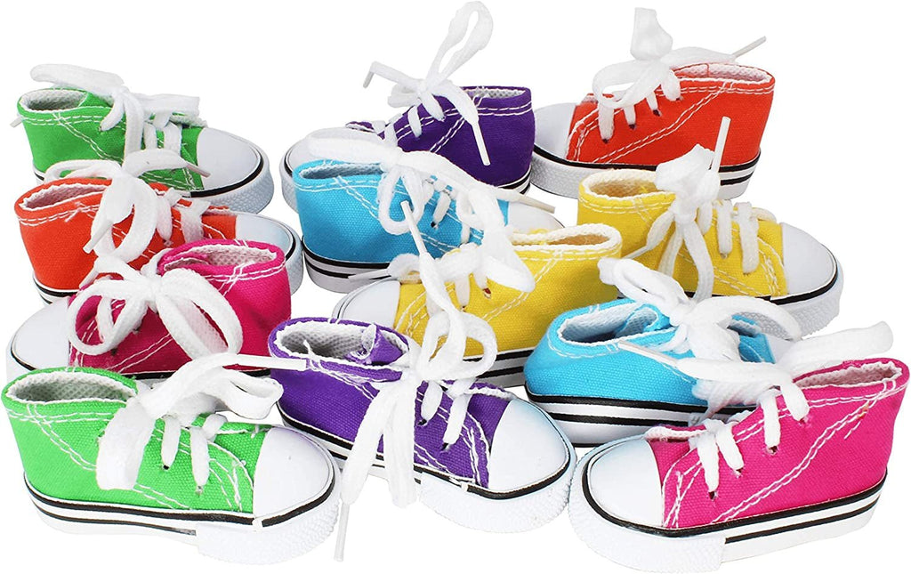 Mini bird sneakers in assorted colors with white laces and rubber toe caps