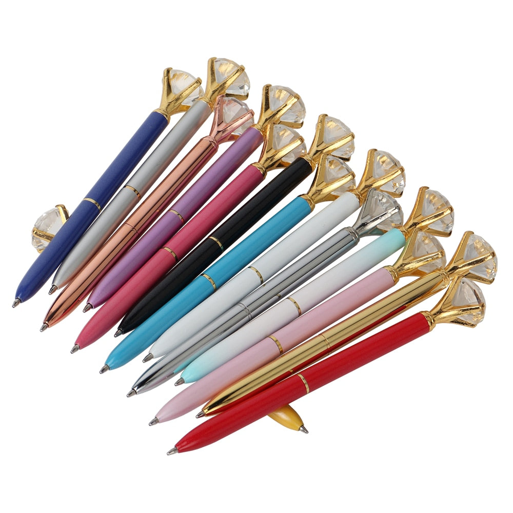 Set of gem-top metal ballpoint pens, blue, rose, black, teal, and gold caps