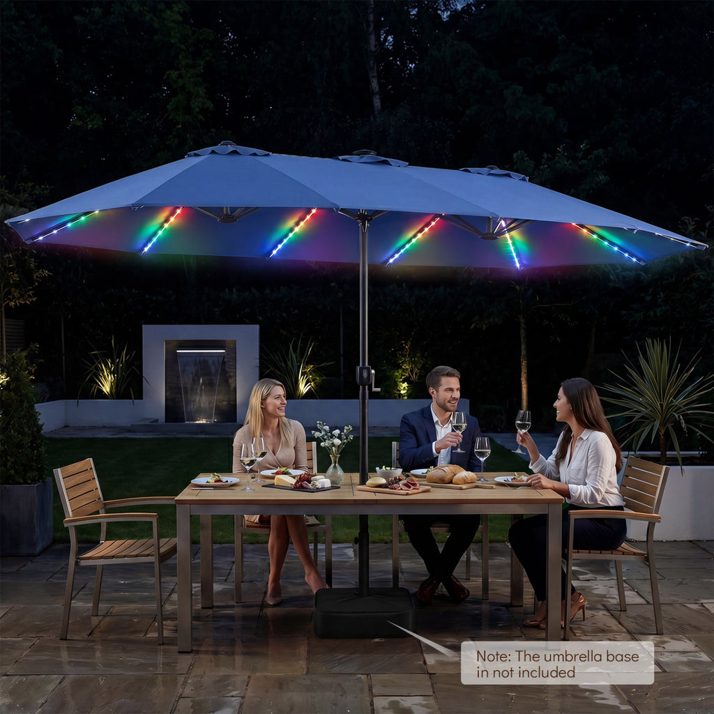 Navy solar LED patio umbrella open over outdoor dining set at night
