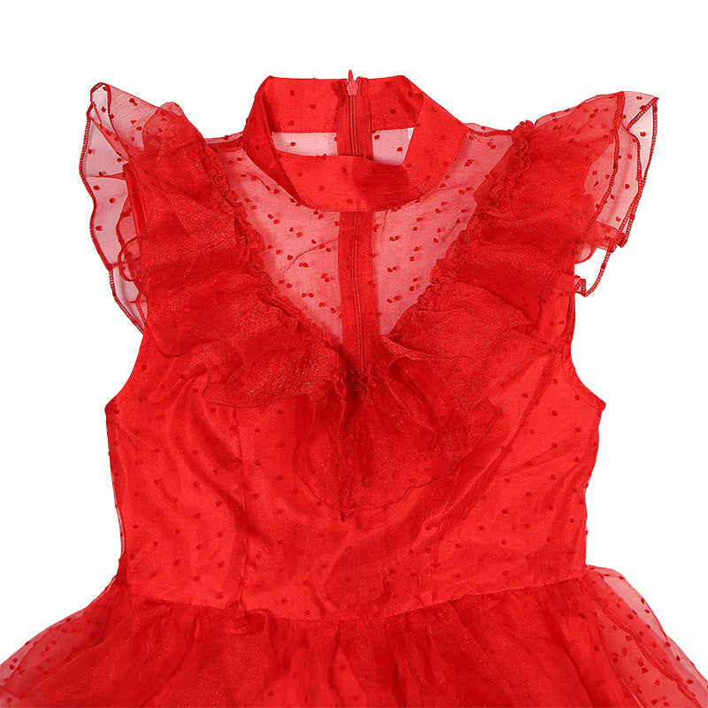 Red lace-look sleeveless bodice with sheer dotted mesh sleeves and ruffled neckline