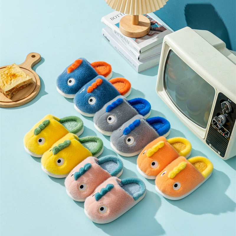 Children’s plush dragon house slippers in multiple colors with cartoon faces