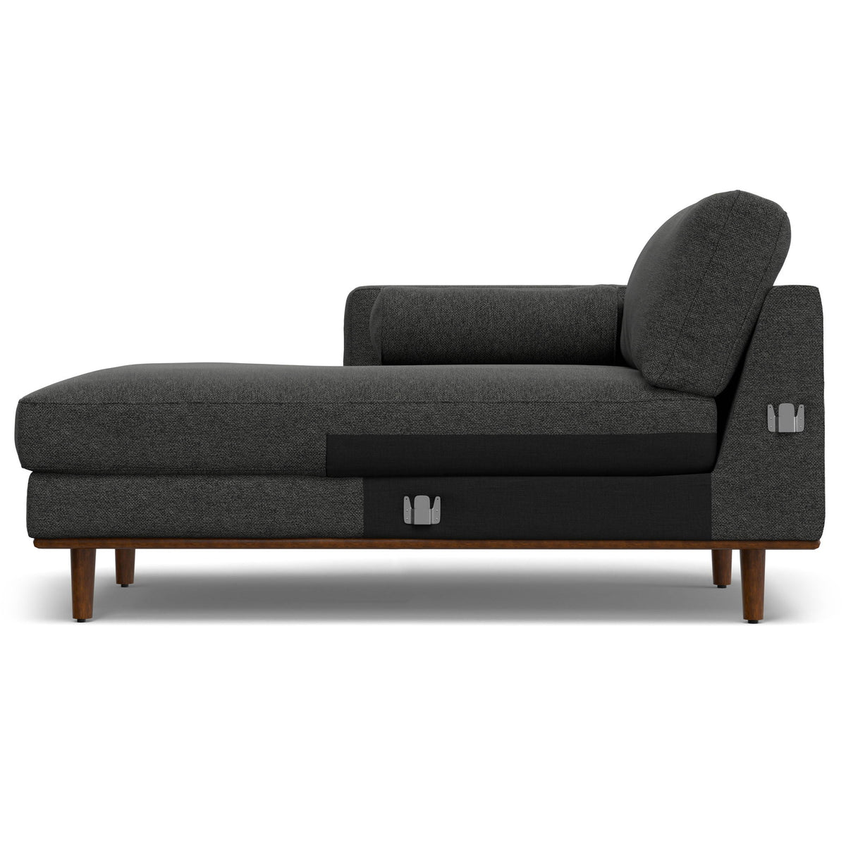 Upholstered sectional sofa in dark gray fabric with curved chaise and accent lumbar pillows