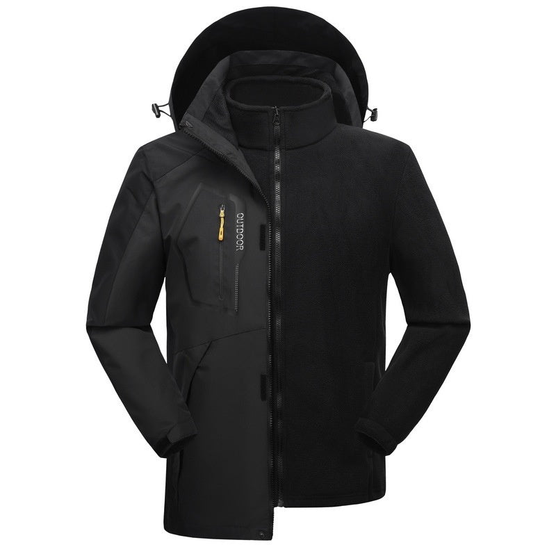 Black three-in-one winter coat with hood and gold zipper accent