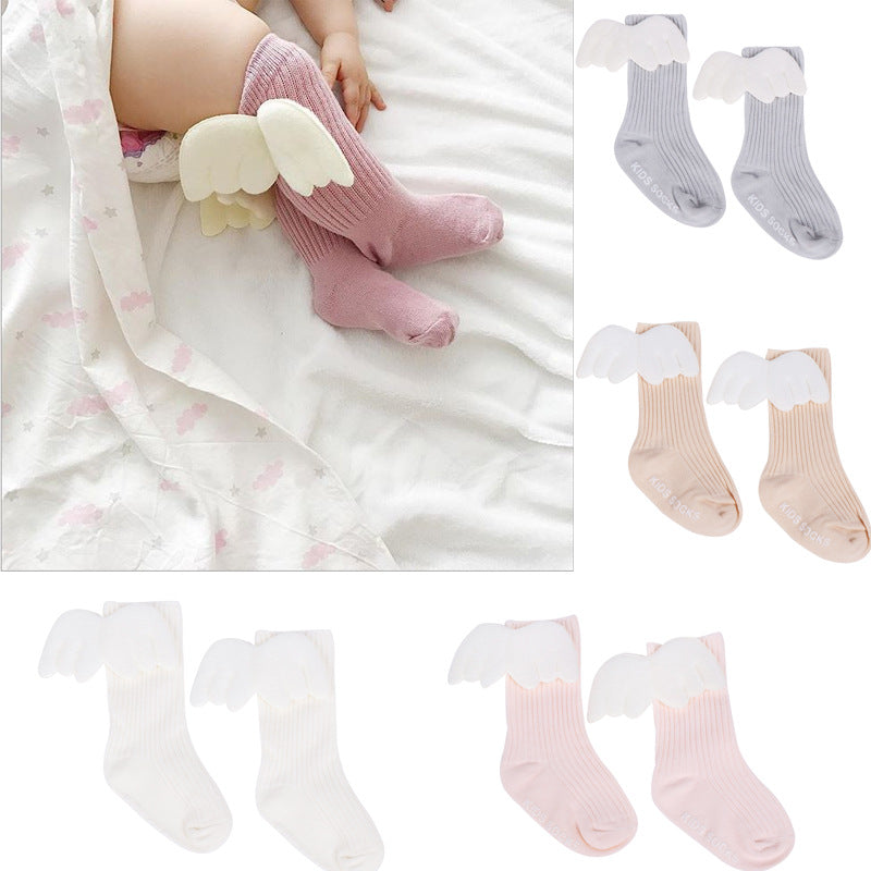 Pink baby socks with white angel wing cuffs, ribbed knit, ankle length