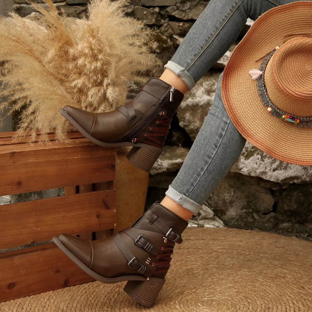 Dark brown point-toe ankle boots with buckle straps and block heels