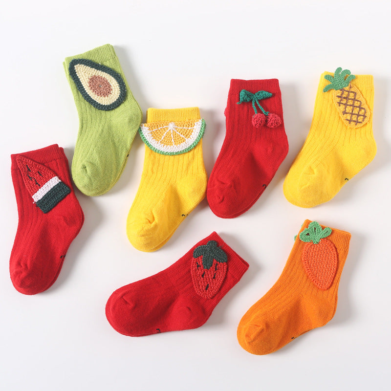 Assorted baby socks set: avocado, citrus, cherry, strawberry, and pineapple motifs on red, yellow, and green
