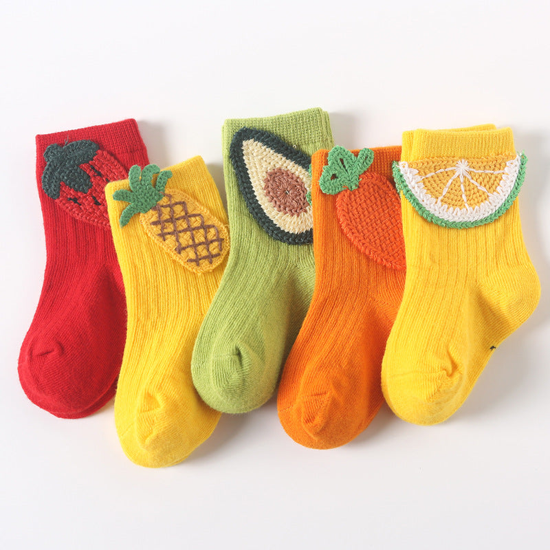 Set of colorful baby socks with fruit and waffle appliques in red, yellow, green, and orange