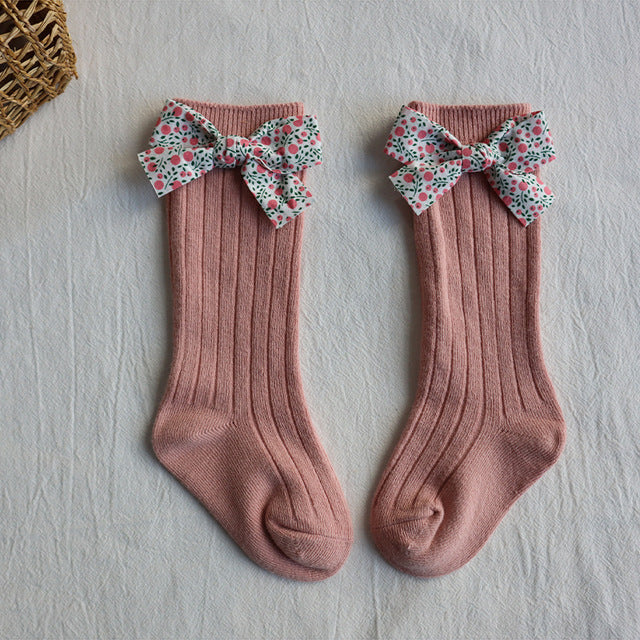 Baby long tube socks, dusty rose ribbed knit with multicolor floral bow cuffs