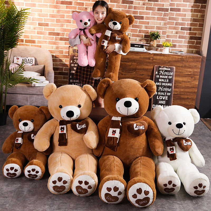 Assorted plush teddy bear toys with heart “Love” patches and bear tags