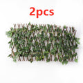 2-piece expandable wooden plant trellis fence set with green leaf panels