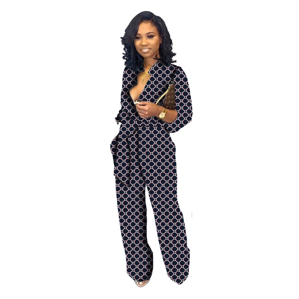 Women’s long-sleeve V-neck jumpsuit in dark blue with linked geometric print, wide legs