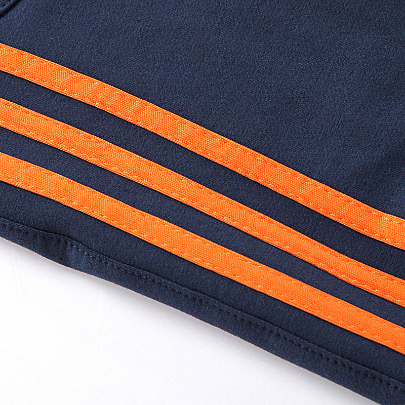 Navy cuff with orange striped trim and stitched hem edge
