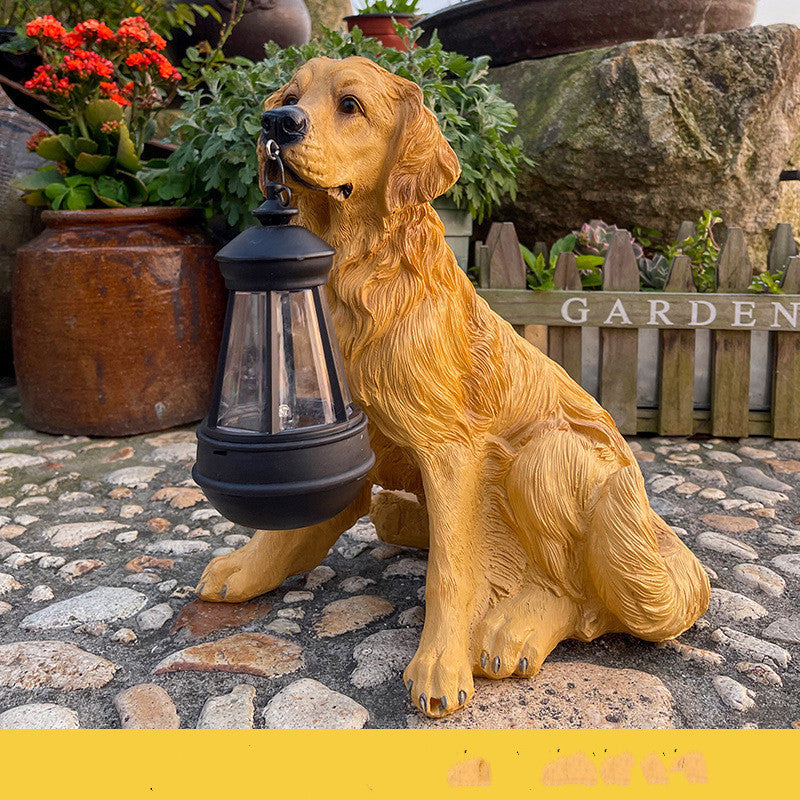 Resin dog lantern sculpture: golden retriever sitting beside a black glass lantern