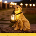 Solar LED dog lantern sculpture: tan dog statue beside a glowing lantern.