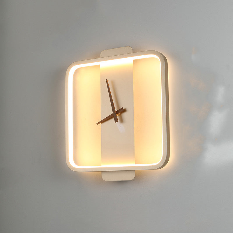 Gold square clock wall lamp with warm LED glow and center clock hands