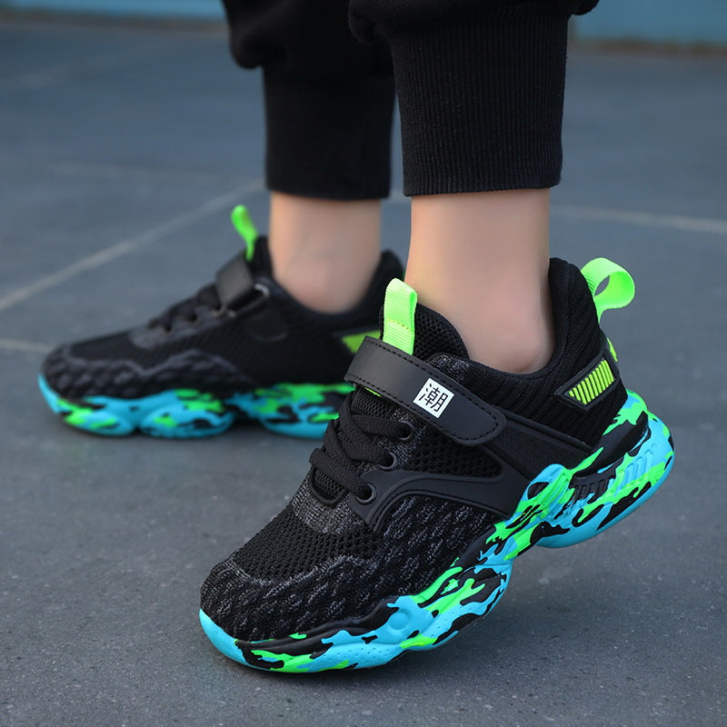 Children's black mesh sports shoes with green neon sole, ankle strap and lace-up