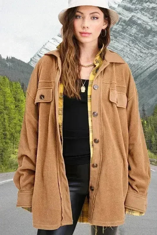 Camel tan oversized fleece jacket with button front and chest flap pockets