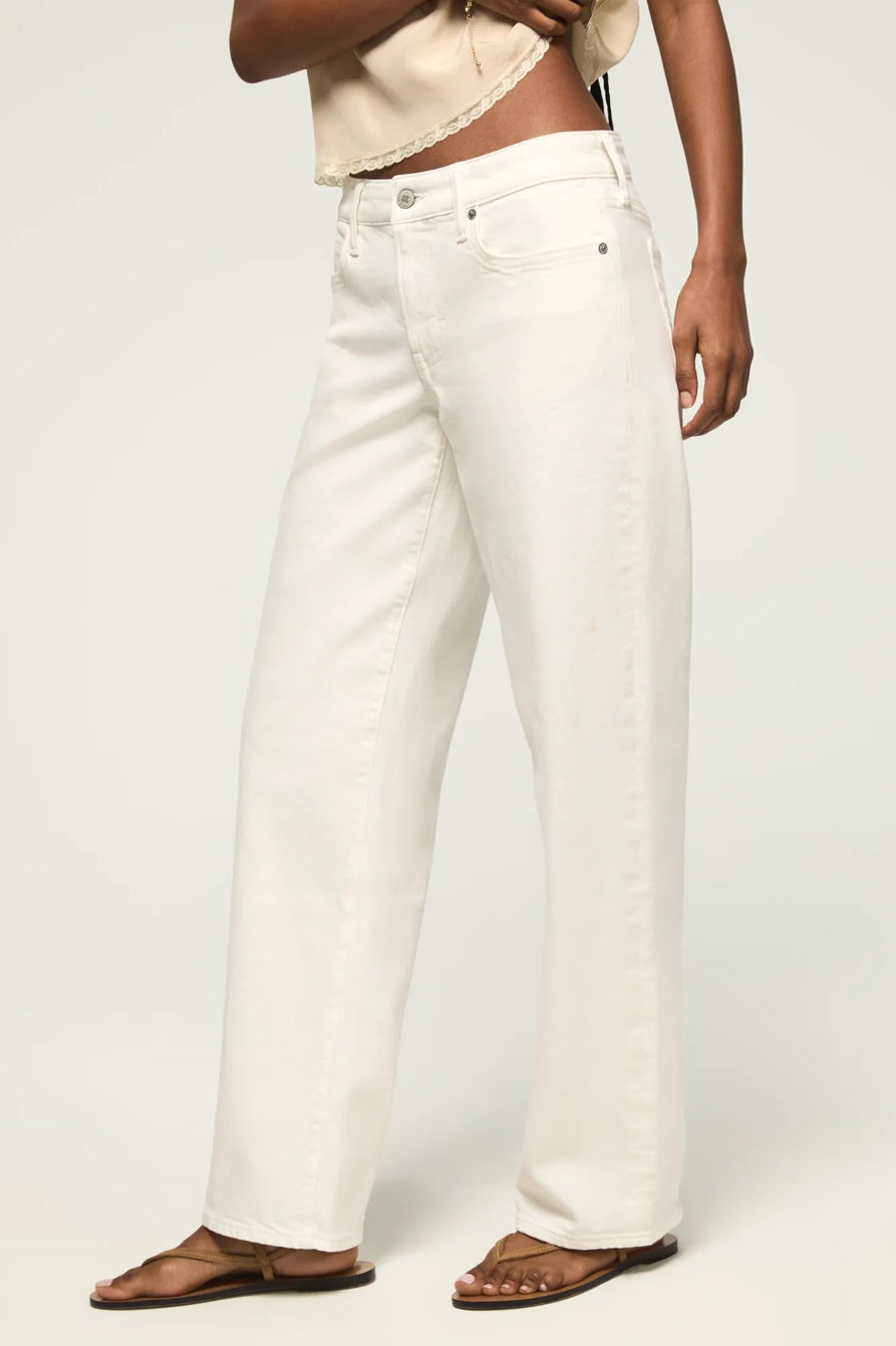 Women's baggy white jeans with button waist, five-pocket design and belt loops