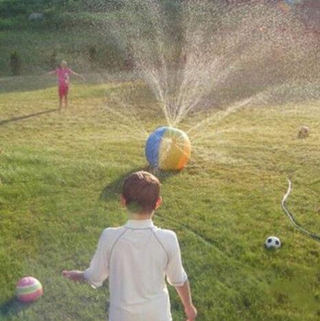 Inflatable spray water ball toy spraying water from top, blue and orange panels