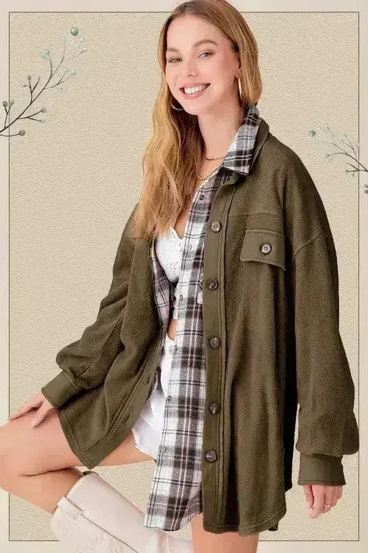 Olive green oversized fleece jacket with button front and two chest pockets