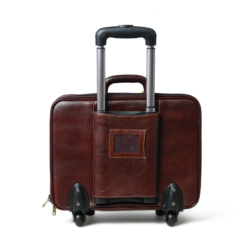 Brown leather trolley suitcase bag rear view with telescopic handle and caster wheels