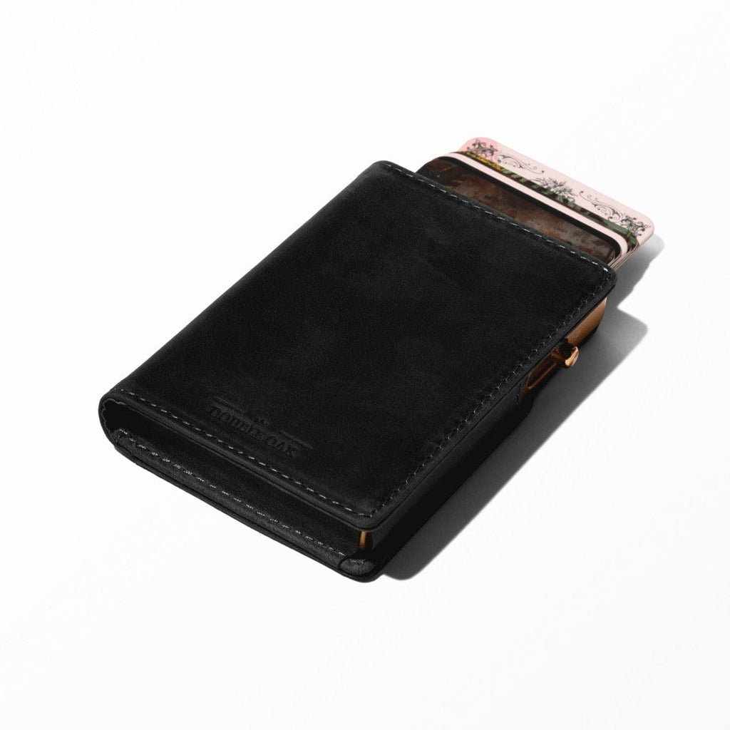 Black bifold leather wallet with card slots protruding and stitched border