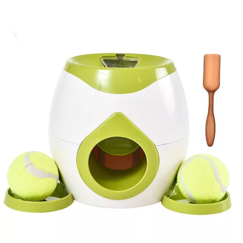 White and green smart pet feeder with large green ball opening and tennis balls
