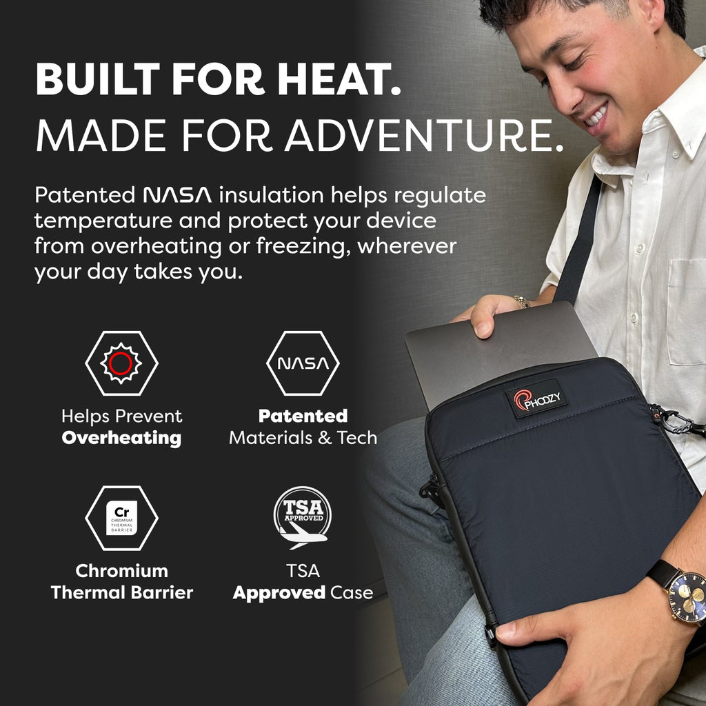 Dark tablet and laptop pouch held by person, showing front logo patch and zipper