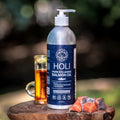 Icelandic salmon oil bottle with white pump dispenser and dark-blue label