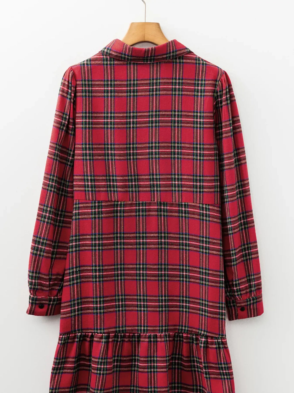 Back view of burgundy plaid long-sleeve mini dress with ruffle hem tier