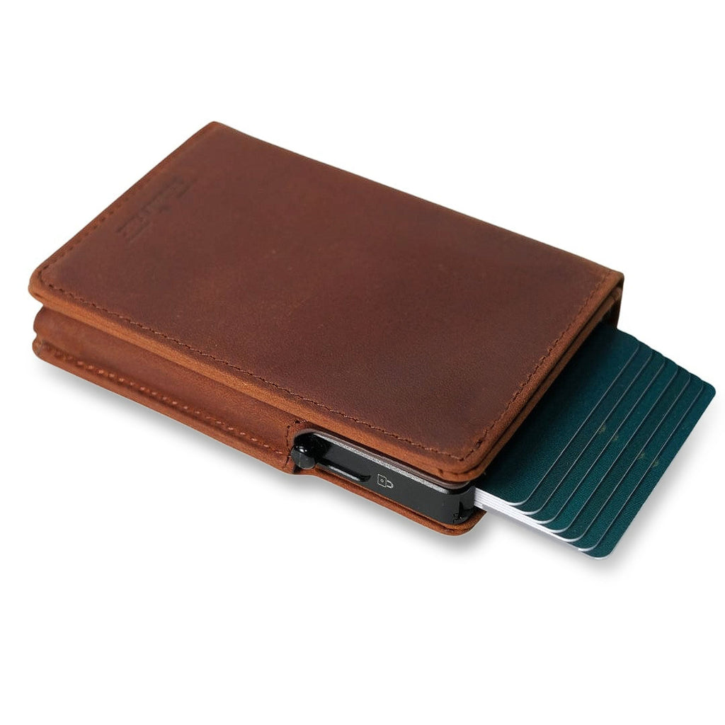 Brown leather bifold wallet with snap closure and card slots