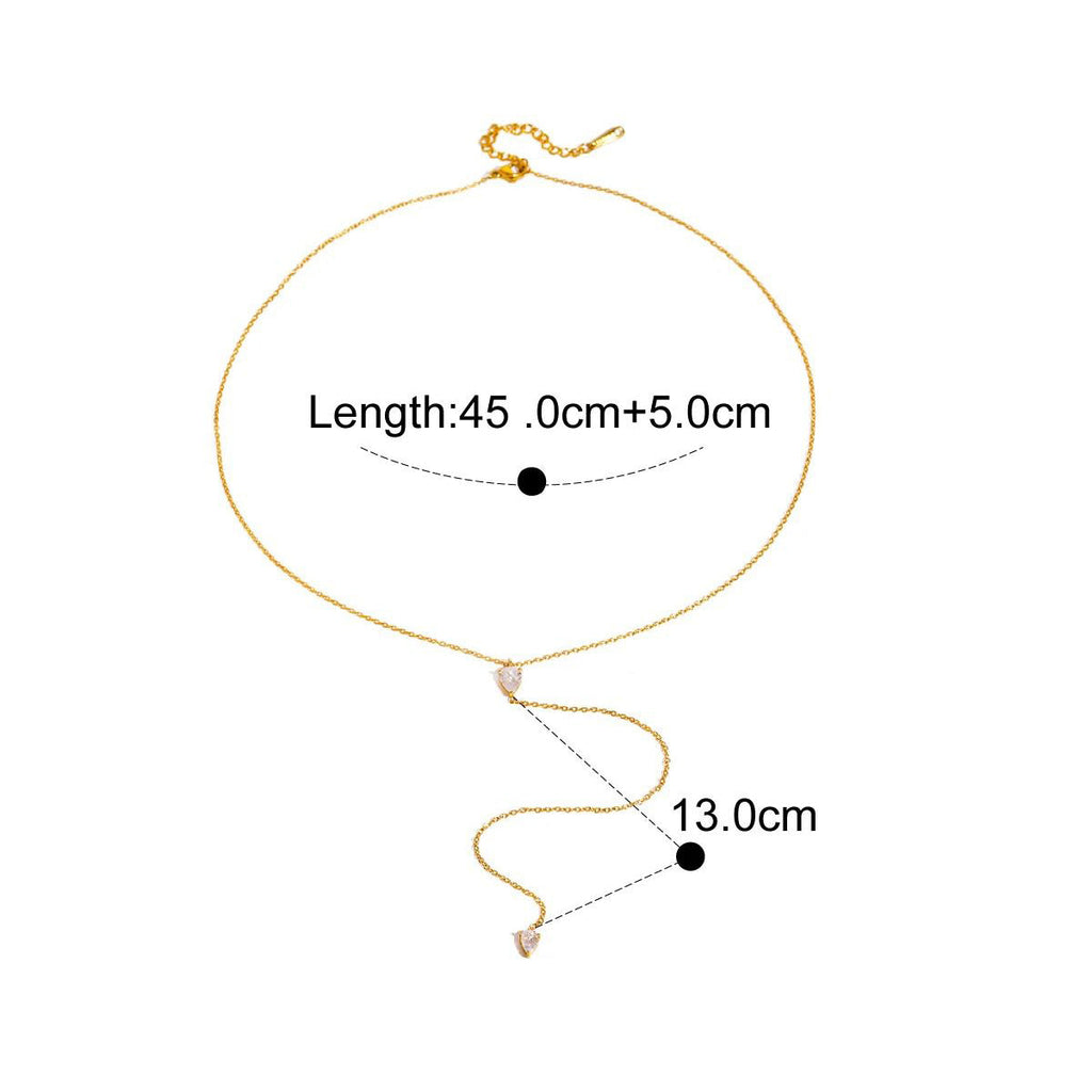 Gold-tone teardrop crystal charm necklace with fine chain