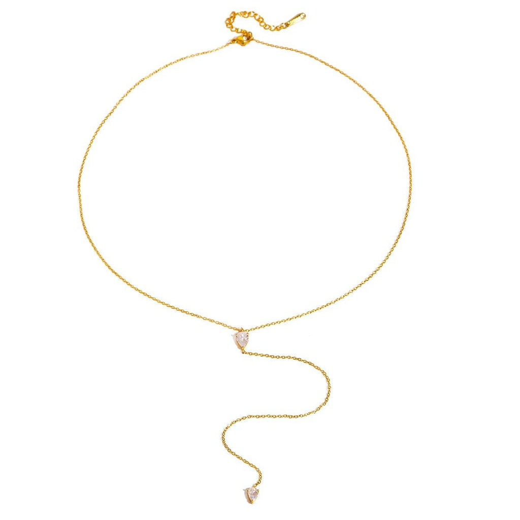 Gold-tone chain necklace with a small faceted teardrop crystal charm