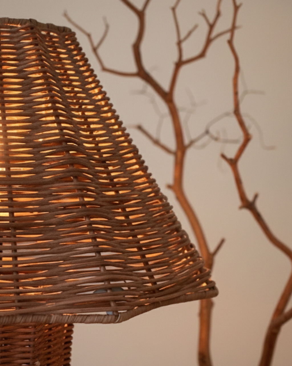 Woven rattan lamp shade detail with warm glow