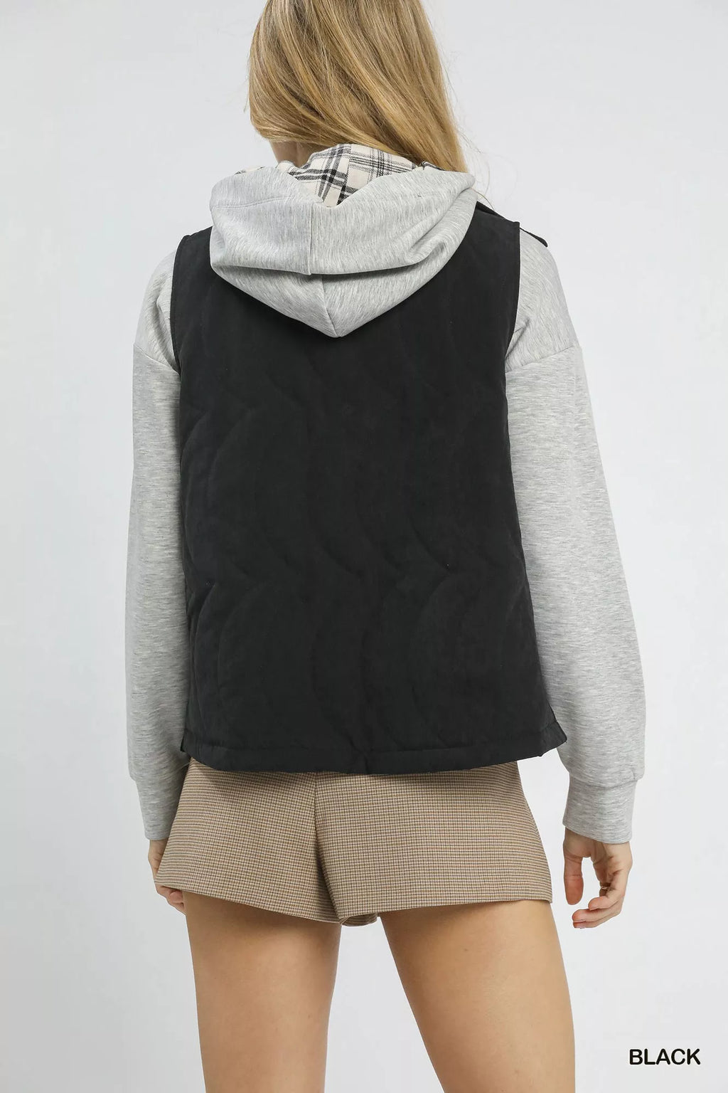 Black quilted embroidered sleeveless vest from back view