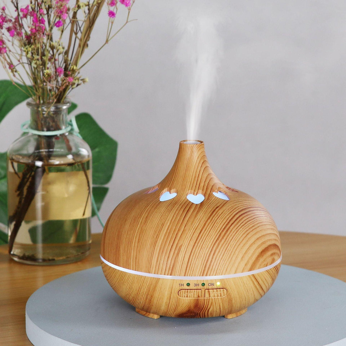 Wood-grain aromatherapy diffuser with white heart LED lights and mist