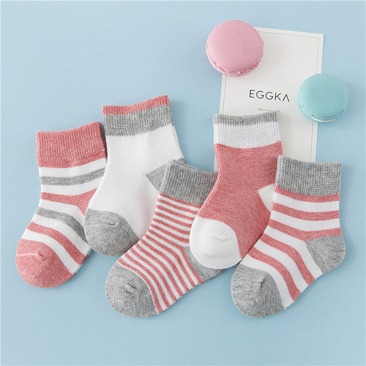 Children's winter cotton striped socks in coral red, white, and gray with ribbed cuffs