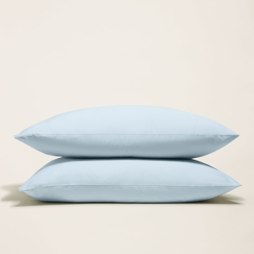 Light blue sateen pillowcase set, two folded pillowcases with smooth satin finish